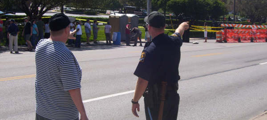 Omaha Police directing pedestrian to appropriate "pen"  